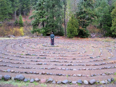 Brent VanFossen stands in the middle of the Breightonbush Hot Springs Labyrinth - photography by Lorelle VanFossen.