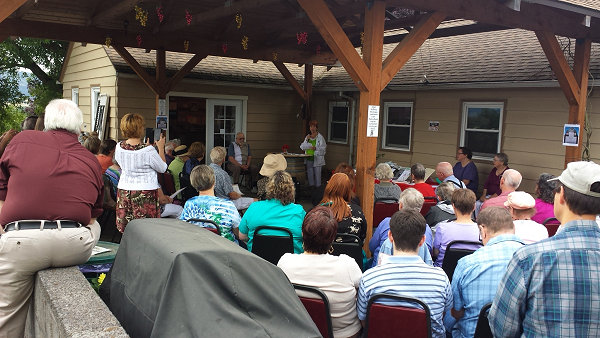 Lend an Ear 2015 - Audience listens to Diana Lubarsky readr - photography by Lorelle VanFossen.